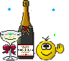 Смайлик рядом с бутылкой шампанского
